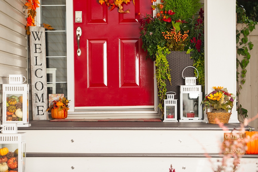 front of house in Autumn representing fall HVAC maintenance for your home.