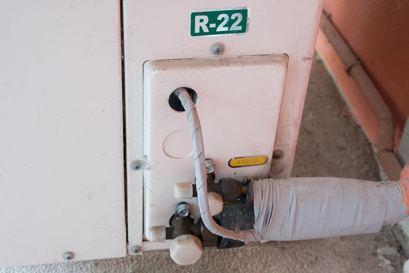 Old AC R-22 needing replaced.