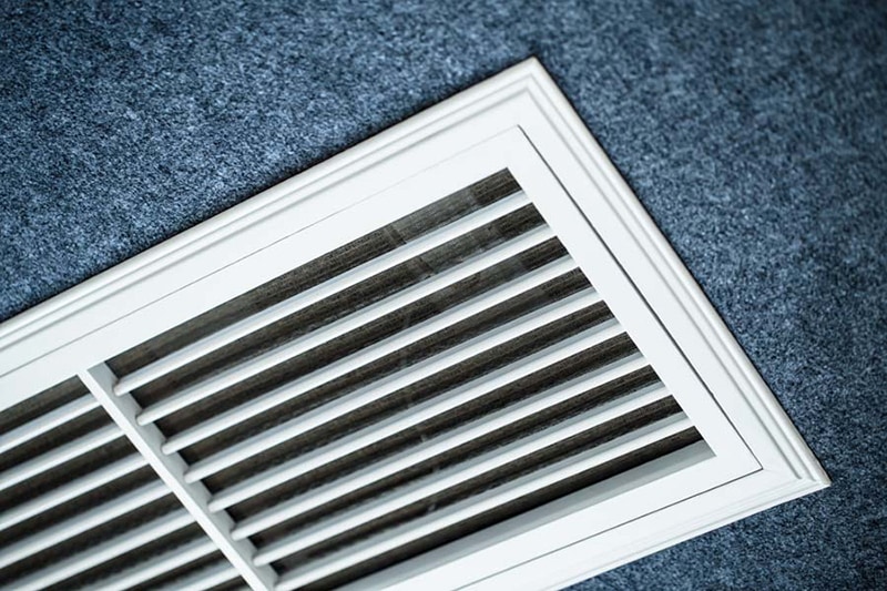Close up shot of the vent of an air conditioner, ac lingo, air conditioning definitions.