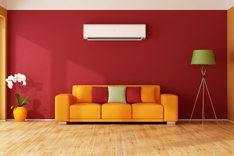 Consider a Ductless AC System, Red and orange living room.