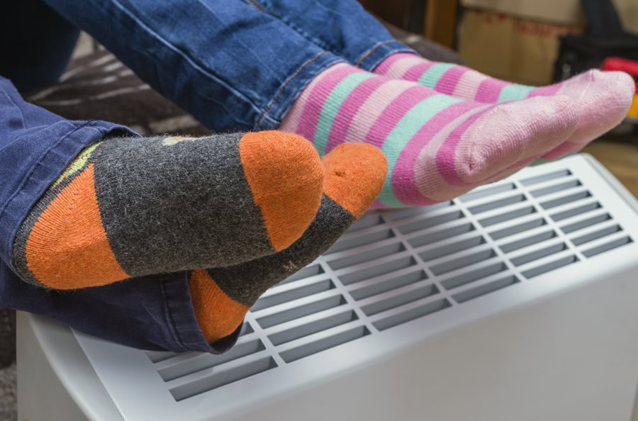 feet by warm vent.